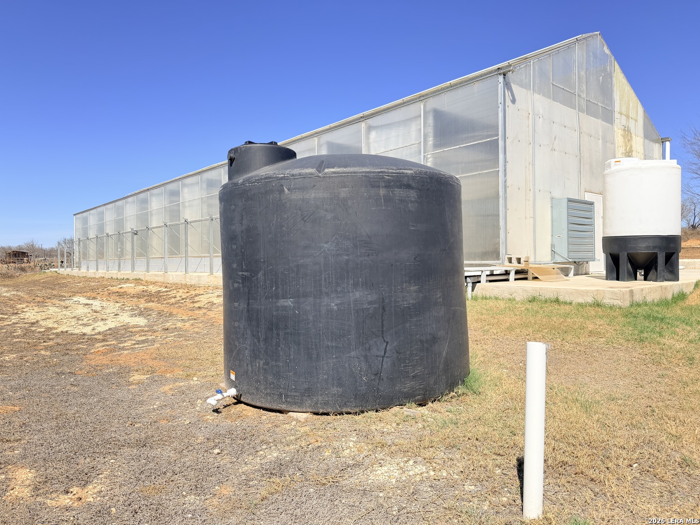 2353 County Road Pearsall, TX 78061 - Photo 11 of 27 a view of a building