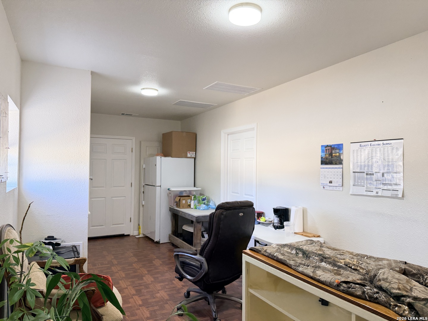 2353 County Road Pearsall, TX 78061 - Photo 19 of 27 a view of a workspace with furniture