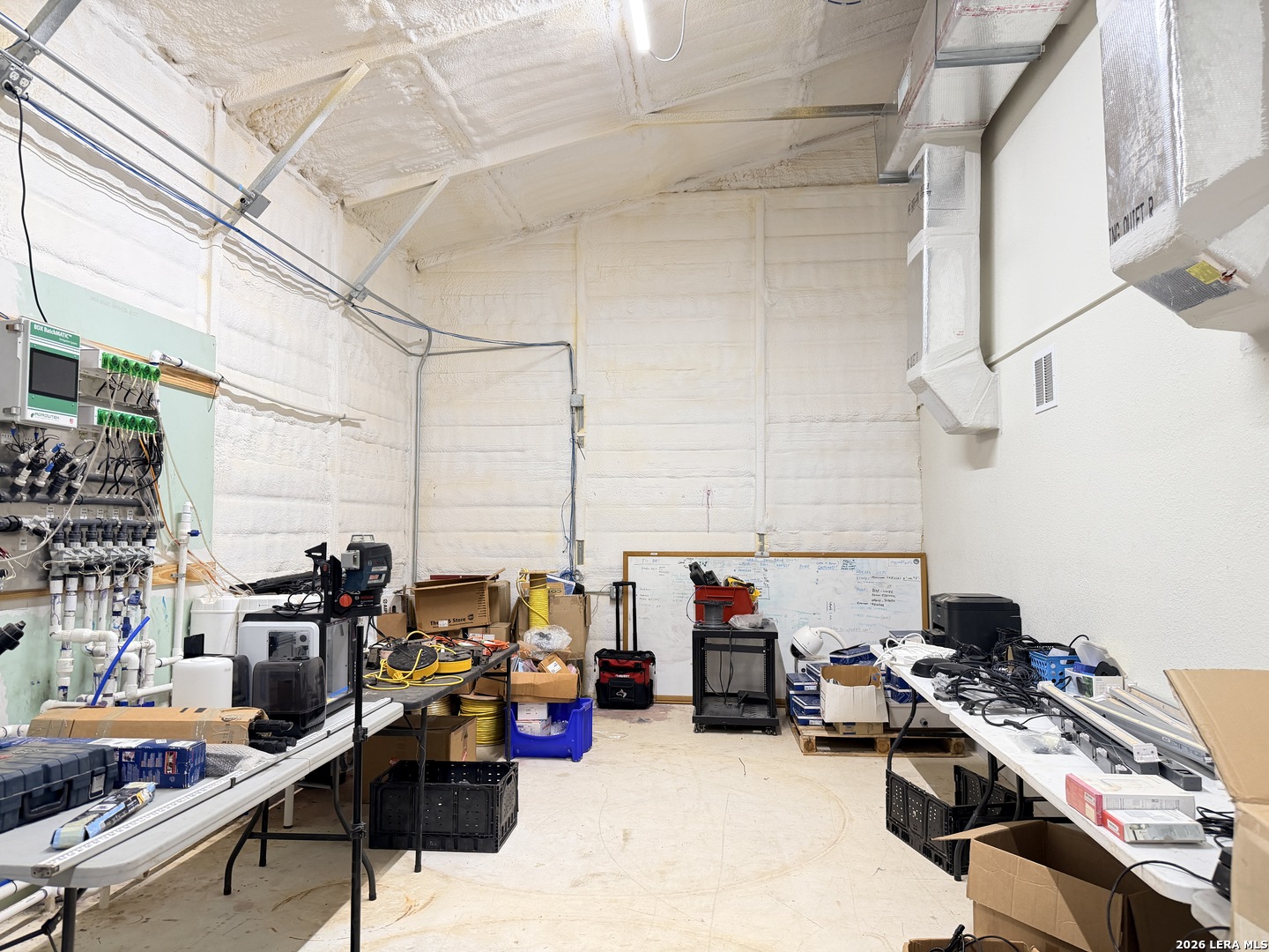 2353 County Road Pearsall, TX 78061 - Photo 23 of 27 a view of a workspace with furniture and a window