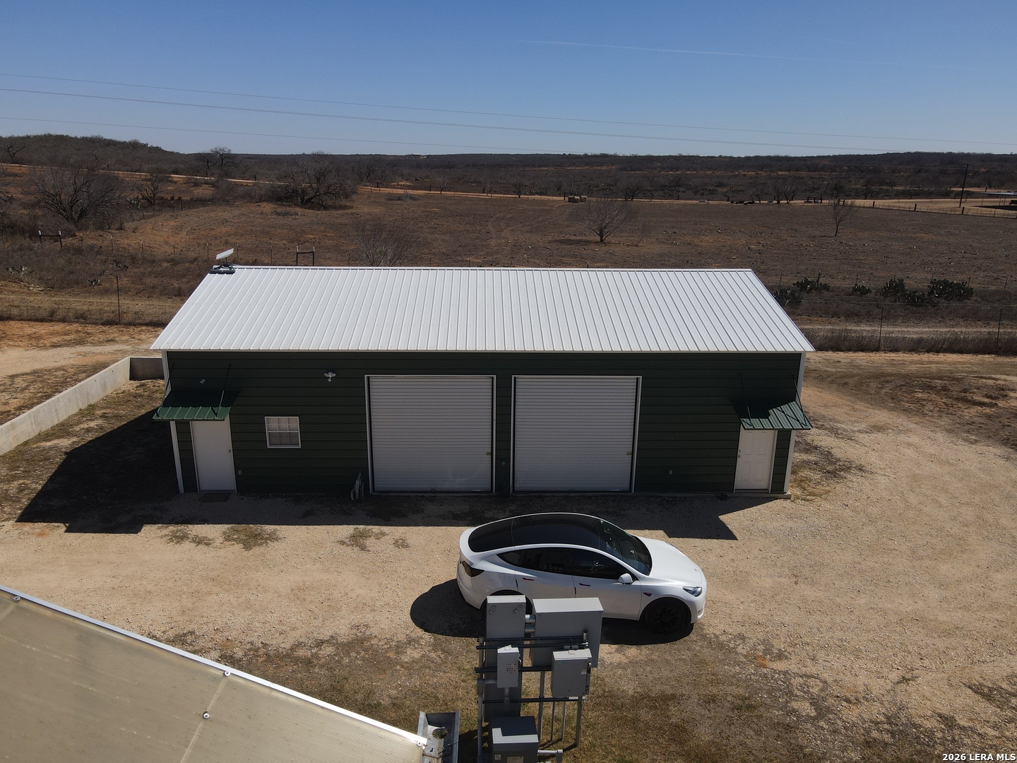 2353 County Road Pearsall, TX 78061 - Photo 6 of 27 a view of swimming pool with outdoor seating