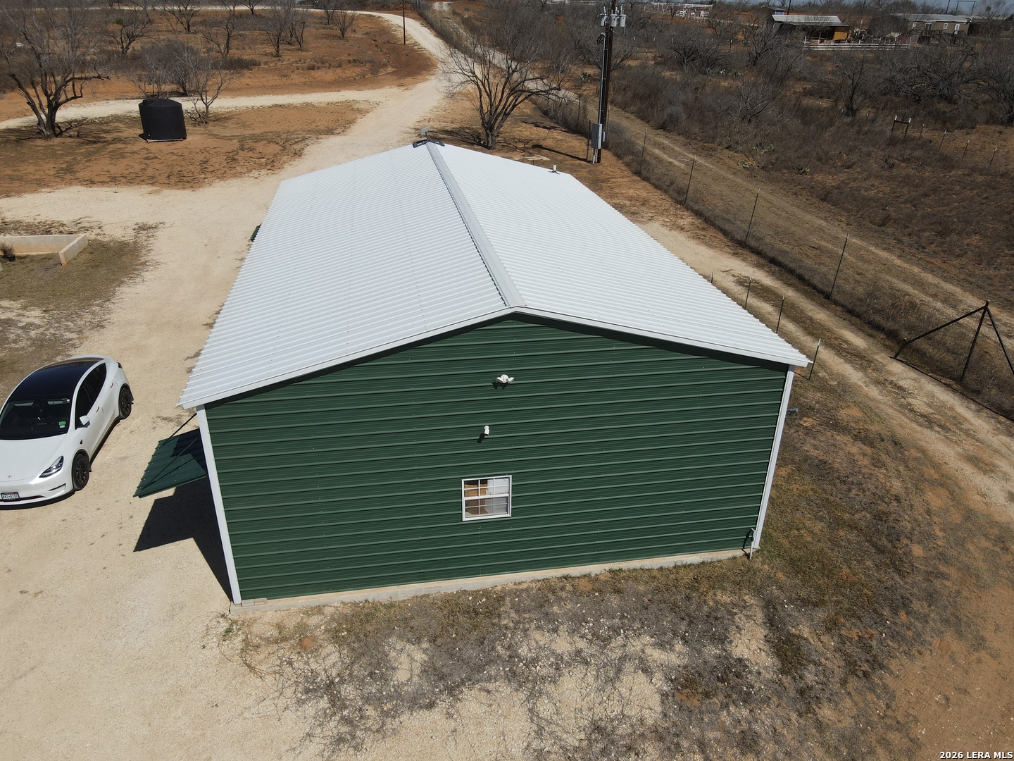 2353 County Road Pearsall, TX 78061 - Photo 7 of 27 a view of a backyard