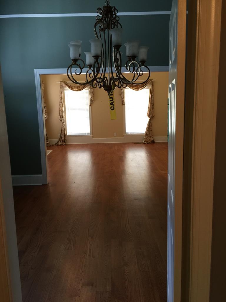 1257 Bass Road Macon, GA 31210 - Photo 4 of 13 a view of a room with painted walls