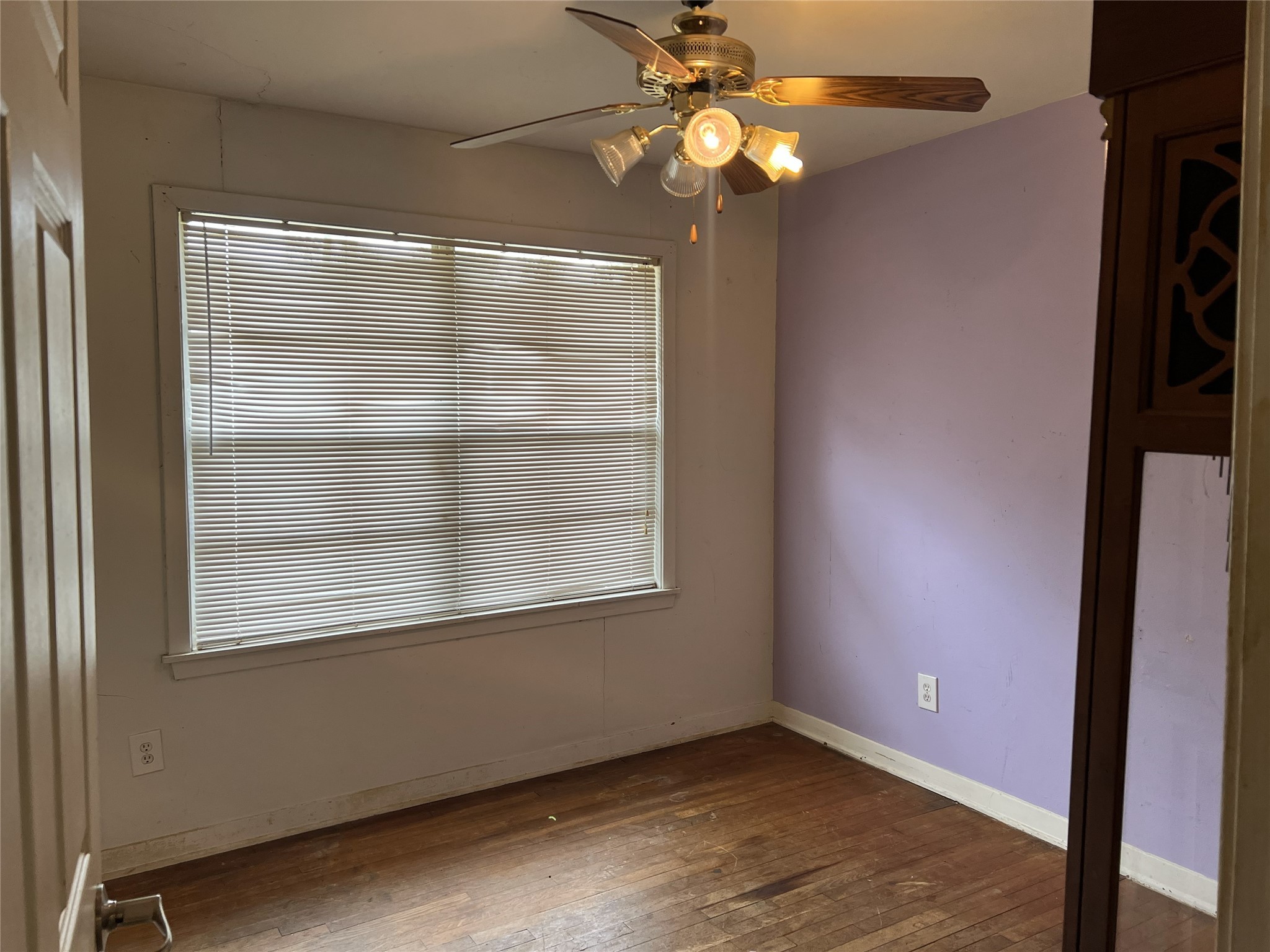 403 Wagers Street Conroe, TX 77301 - Photo 14 of 22 an empty room with a window and a fan