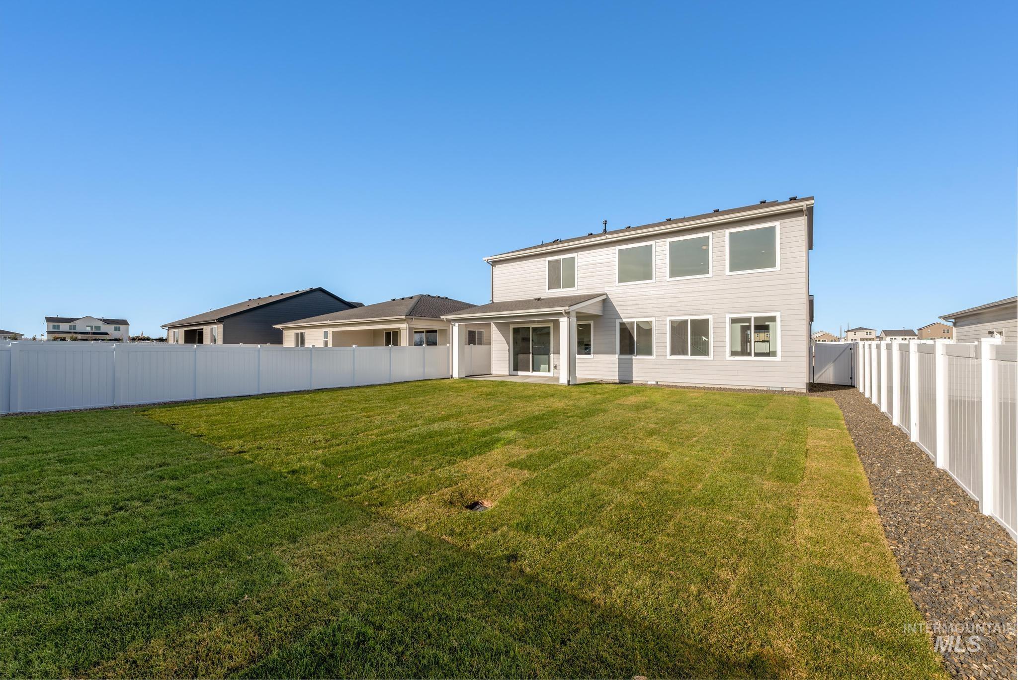1244 Grassland Street Middleton, ID 83644 - Photo 10 of 10 Rear view of property with a patio and a fenced backyard