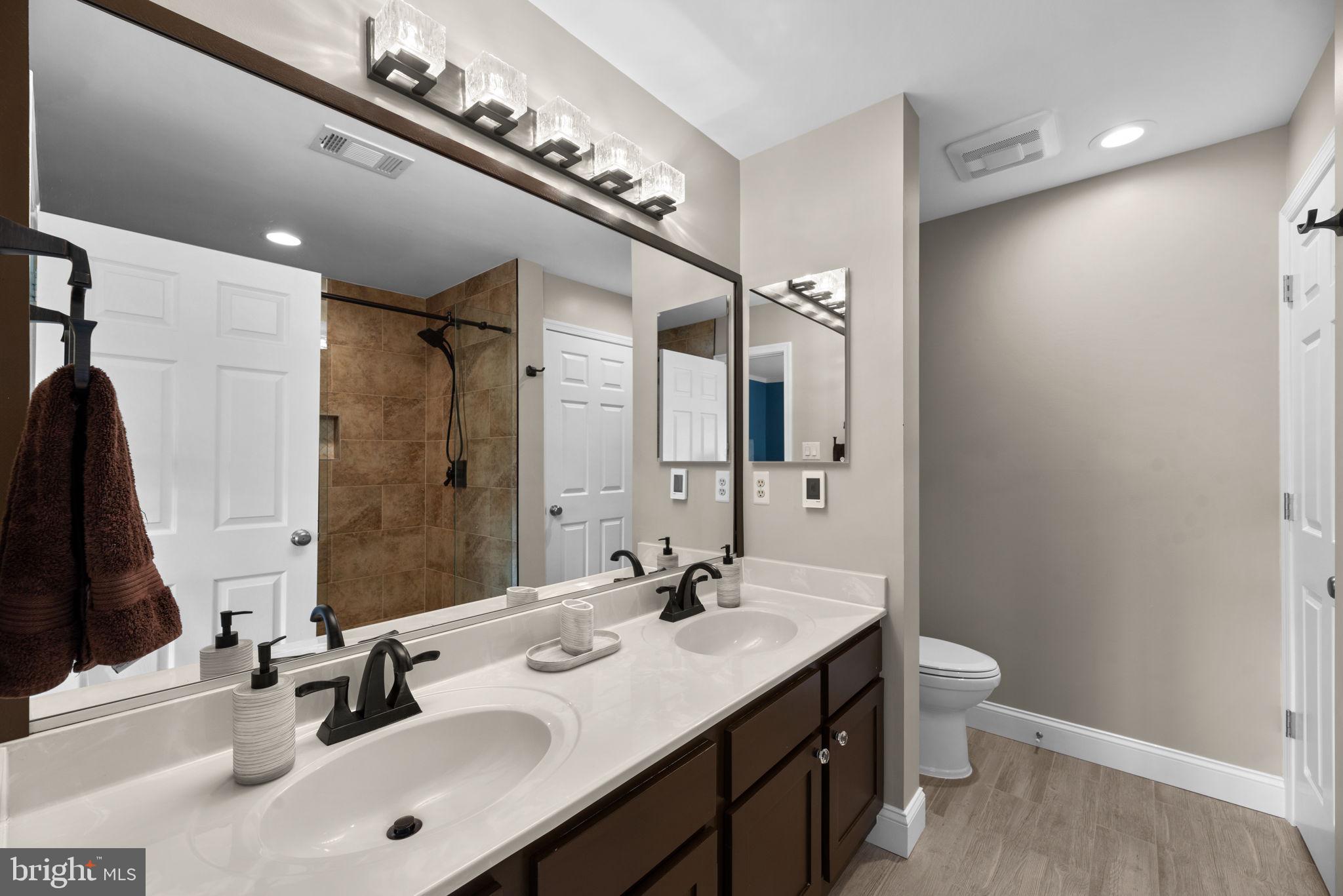 5239 Columbia Road, Unit 5 70 Columbia, MD 21044 - Photo 25 of 59 Primary bath; heated tile floor.