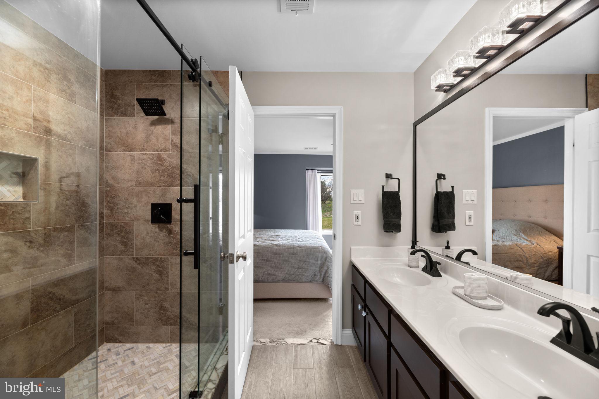 5239 Columbia Road, Unit 5 70 Columbia, MD 21044 - Photo 26 of 59 Primary bath; double vanity, updated fixtures.