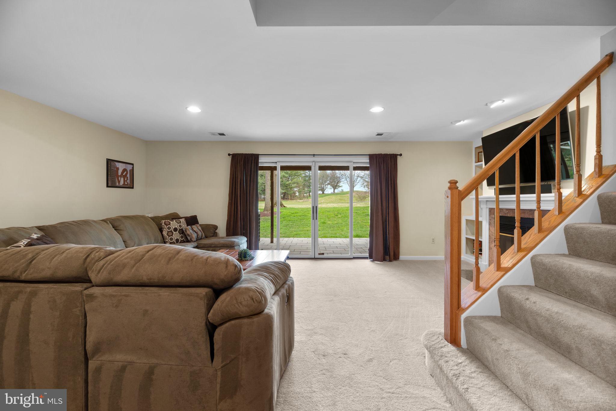 5239 Columbia Road, Unit 5 70 Columbia, MD 21044 - Photo 37 of 59 Lower level; high ceilings, entertainment space.