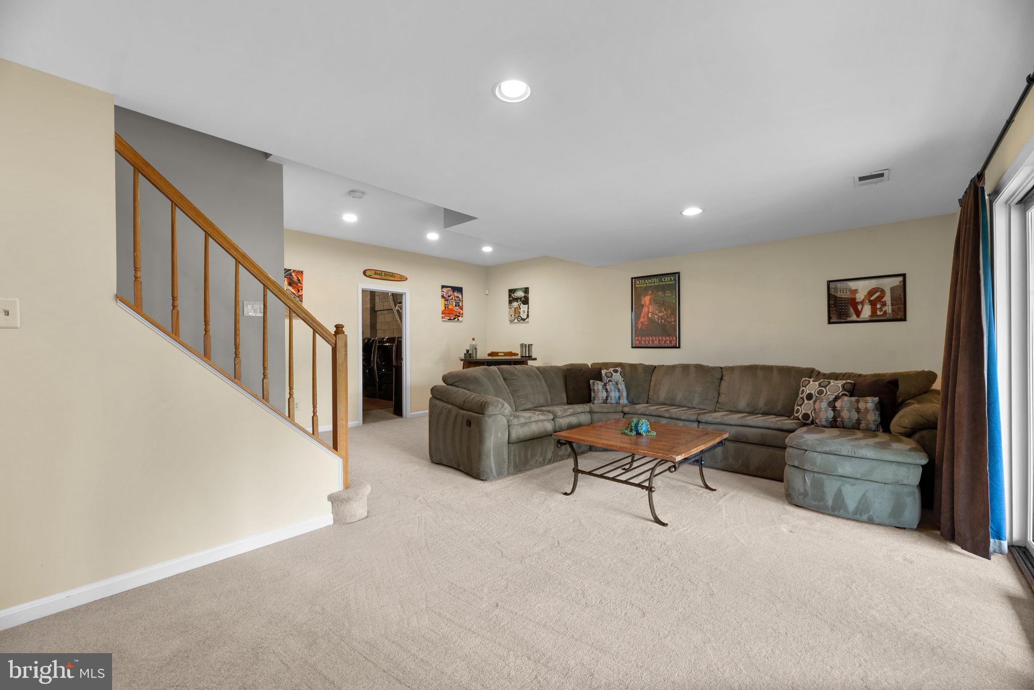 5239 Columbia Road, Unit 5 70 Columbia, MD 21044 - Photo 38 of 59 Lower level; high ceilings, entertainment space.
