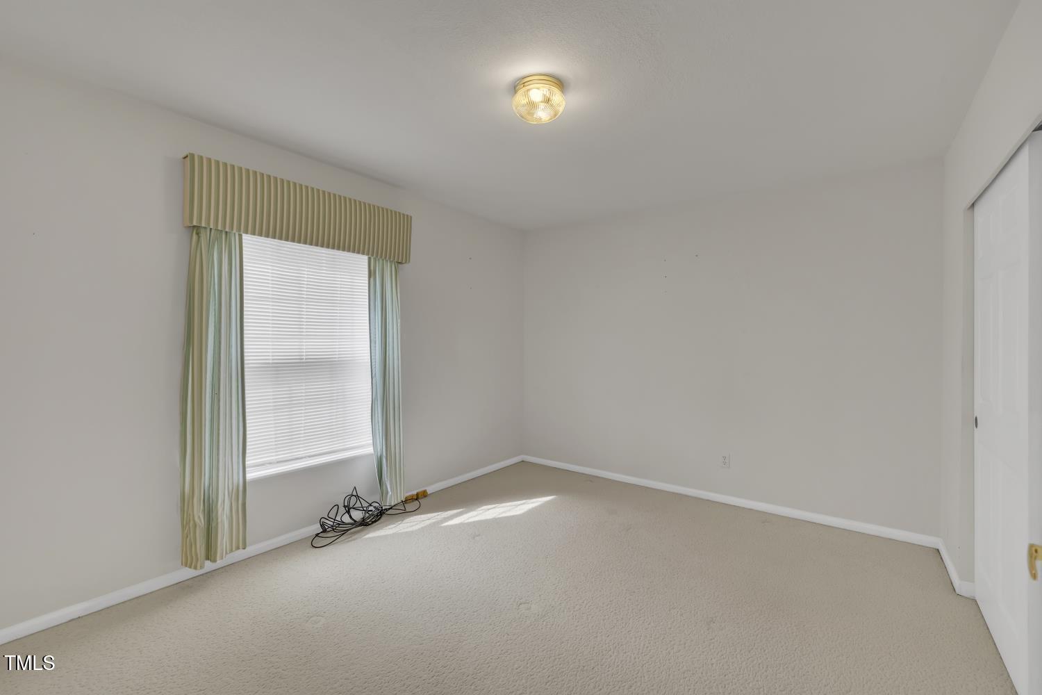 6301 Cayuse Lane Raleigh, NC 27603 - Photo 22 of 30 Second bedroom.