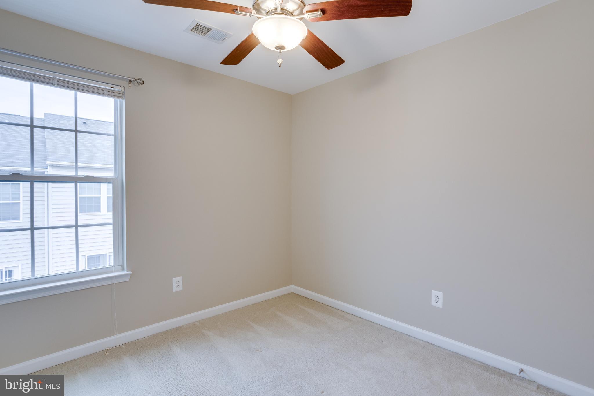 7012 Trek Way Gainesville, VA 20155 - Photo 23 of 33 an empty room with a window
