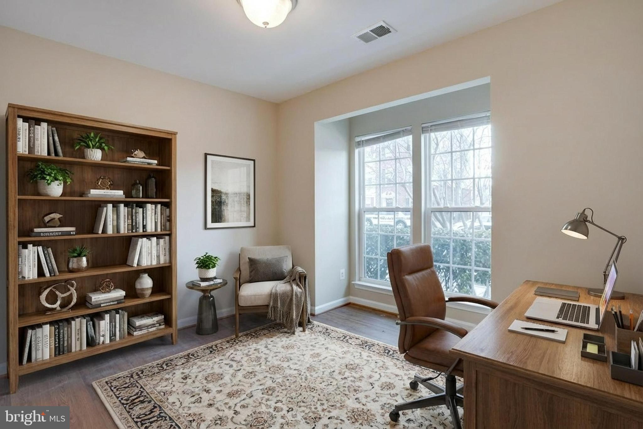 7012 Trek Way Gainesville, VA 20155 - Photo 6 of 33 a living room with furniture a rug and a window