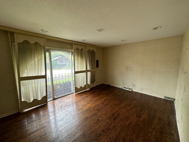 2647 Salceda Drive Northbrook, IL 60062 - Photo 11 of 19 a view of an empty room with wooden floor and a window
