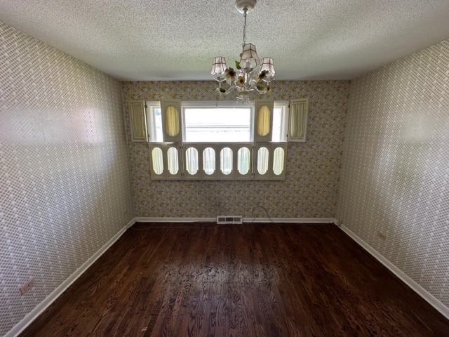 2647 Salceda Drive Northbrook, IL 60062 - Photo 13 of 19 a view of wooden floor and chandelier in living room
