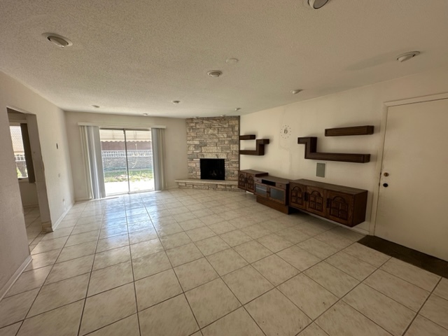 2647 Salceda Drive Northbrook, IL 60062 - Photo 5 of 19 a living room with furniture and a fireplace