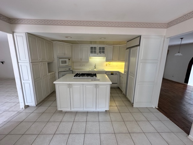 2647 Salceda Drive Northbrook, IL 60062 - Photo 6 of 19 a kitchen with a sink a refrigerator and cabinets