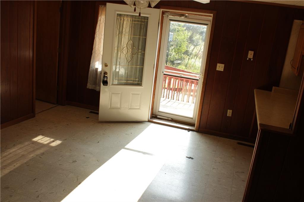 567 Klein Road Sandy Lake, PA 16145 - Photo 12 of 27 a view of an empty room with a window