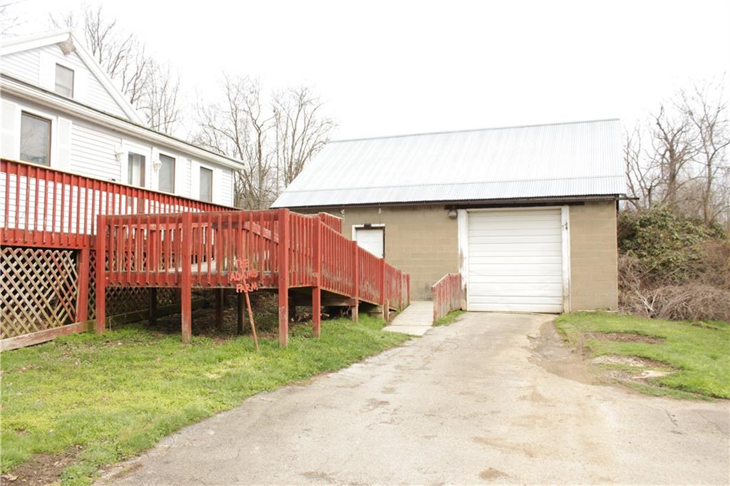 567 Klein Road Sandy Lake, PA 16145 - Photo 2 of 27 a view of a house with a yard and fence