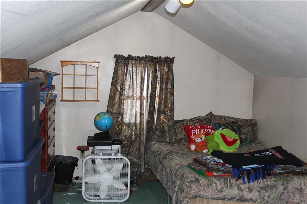 567 Klein Road Sandy Lake, PA 16145 - Photo 22 of 27 a living room with furniture and a window