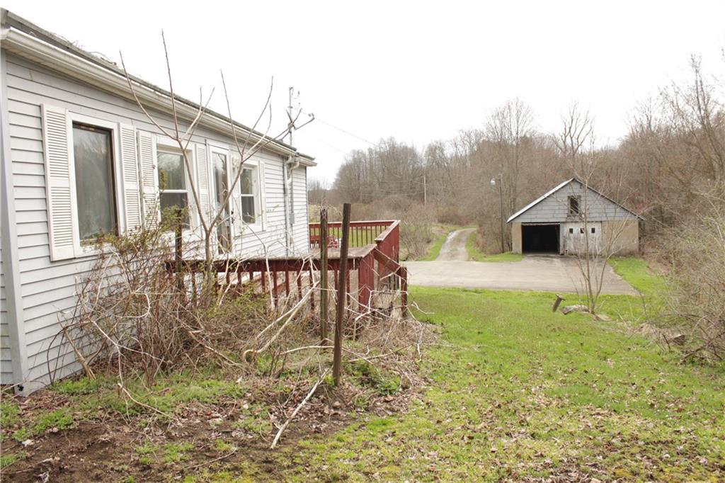 567 Klein Road Sandy Lake, PA 16145 - Photo 25 of 27 a house view with a backyard space
