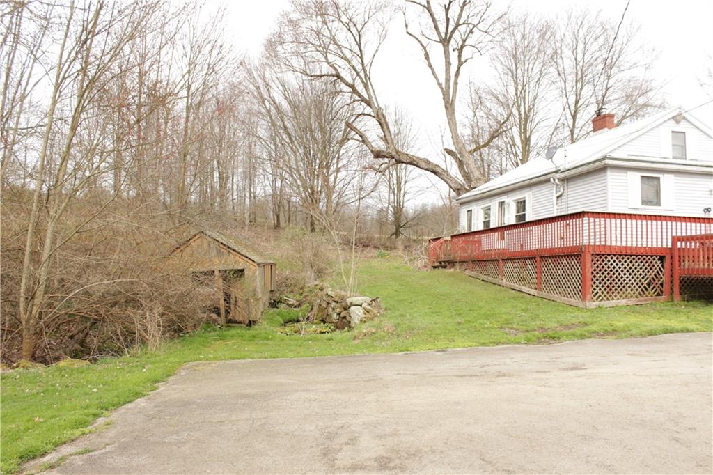 567 Klein Road Sandy Lake, PA 16145 - Photo 6 of 27 a view of a house with a yard