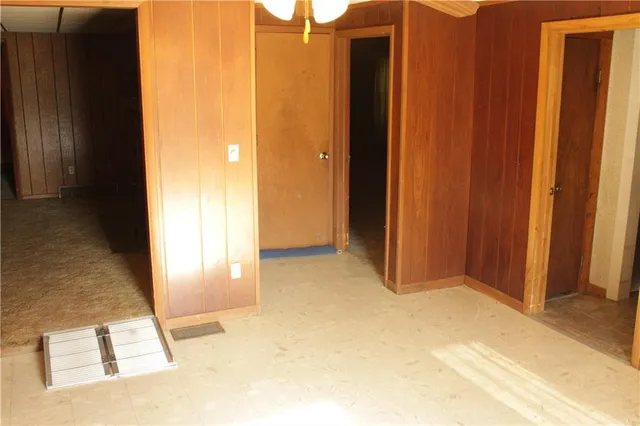 an empty room with windows