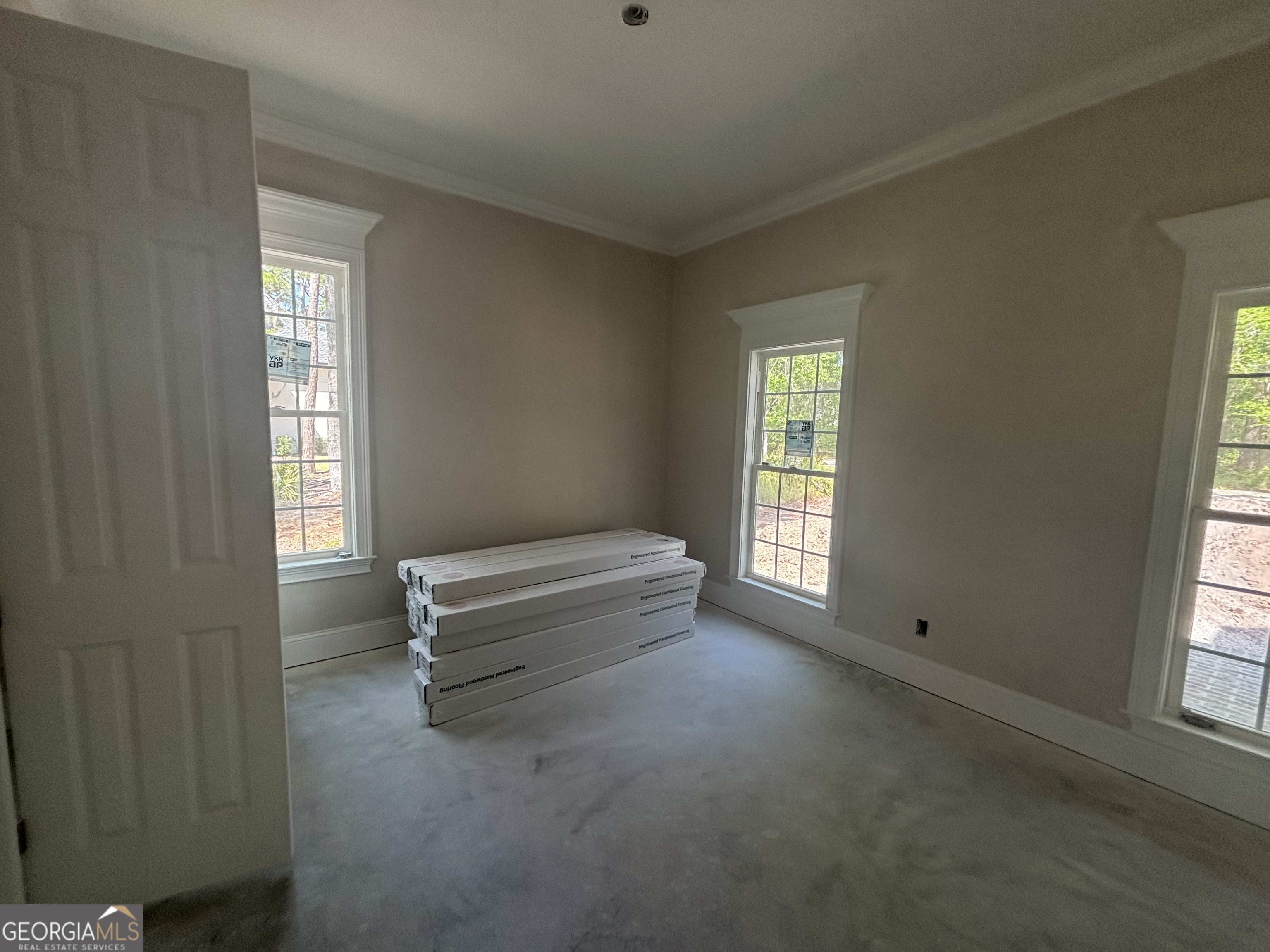 119 Hampton Point Drive St. Simons Island, GA 31522 - Photo 11 of 37 a room with a window and a livingroom