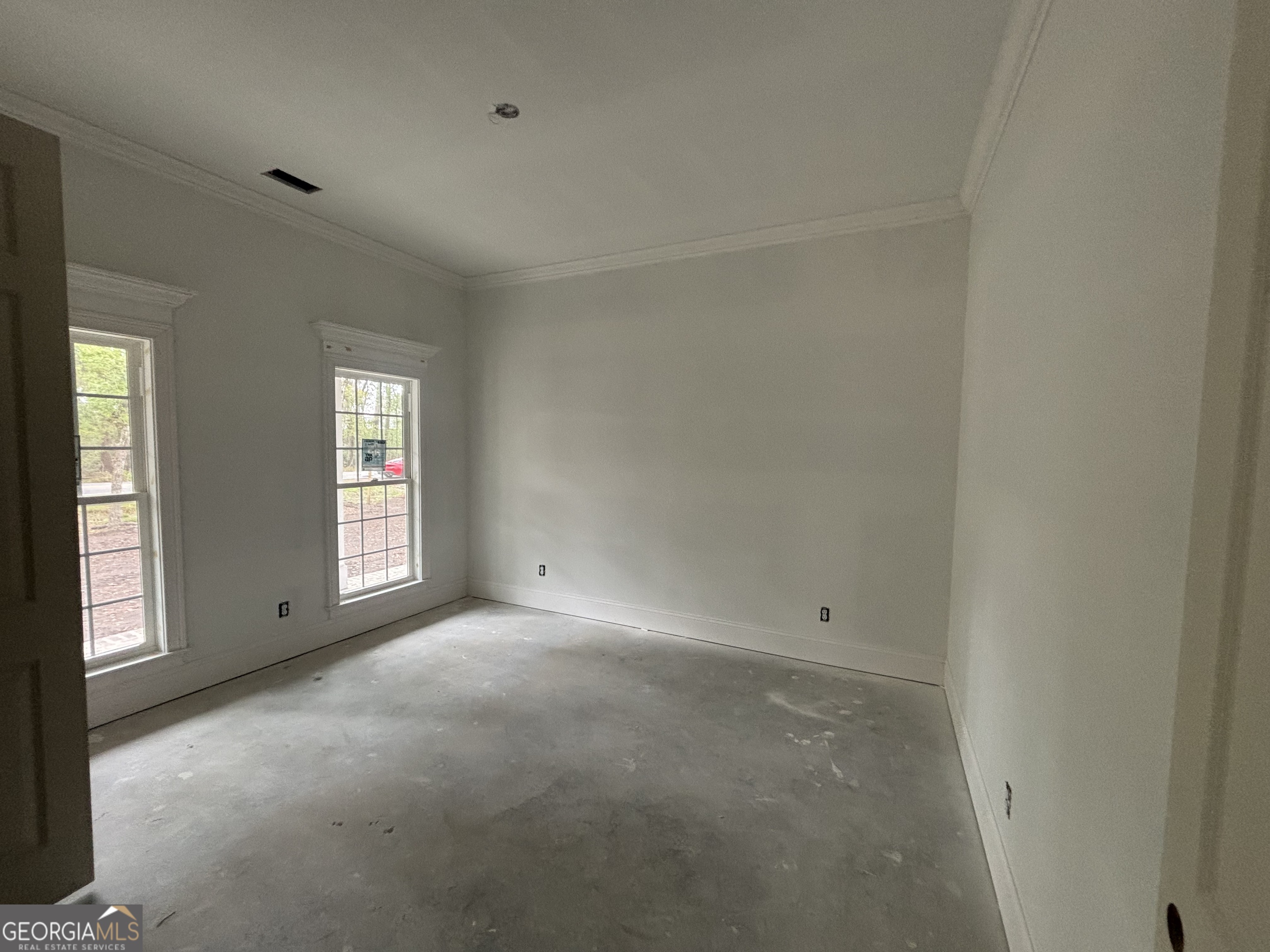 119 Hampton Point Drive St. Simons Island, GA 31522 - Photo 26 of 37 a view of empty room with window