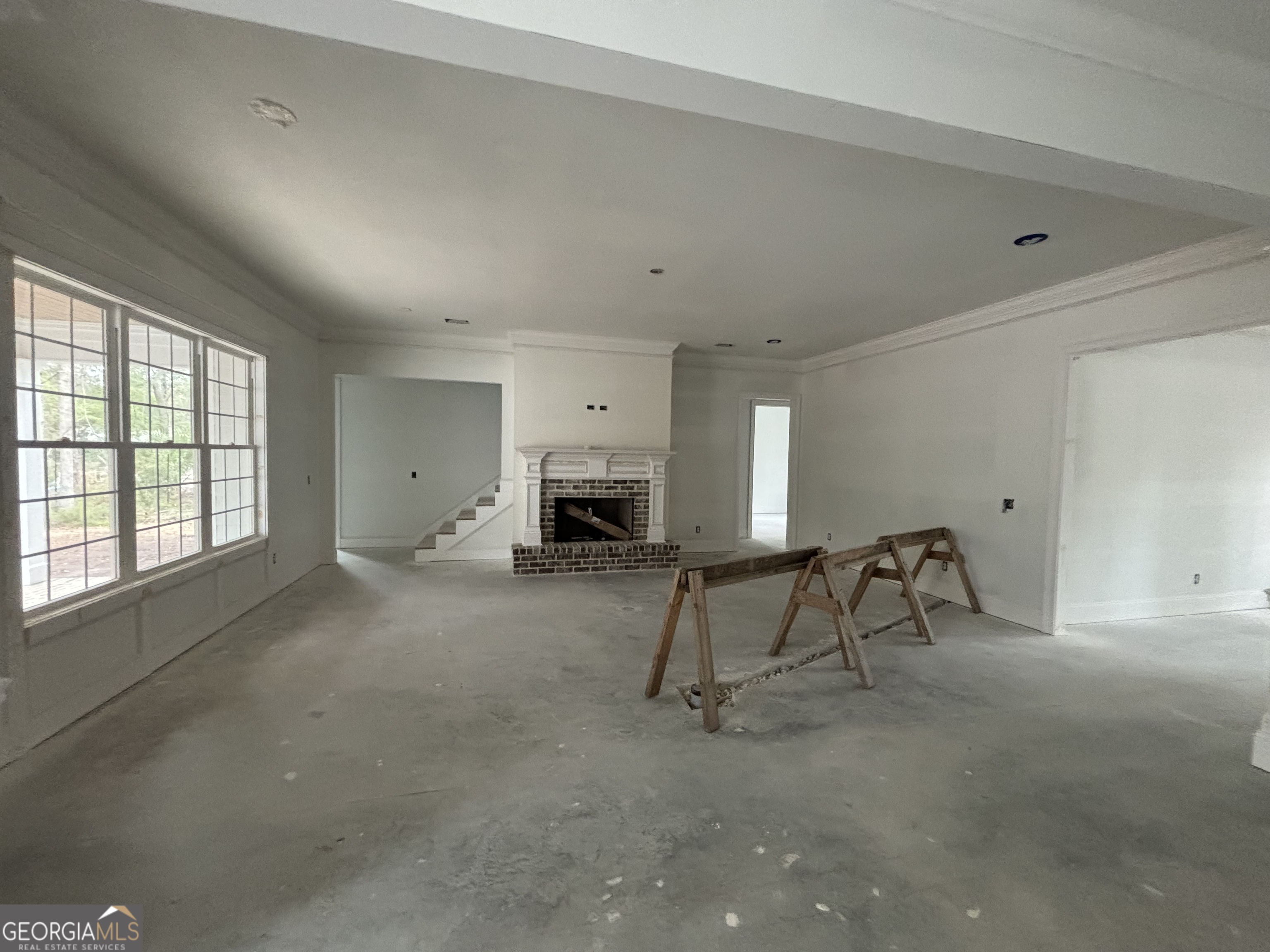 119 Hampton Point Drive St. Simons Island, GA 31522 - Photo 4 of 37 a view of a livingroom with furniture and a window