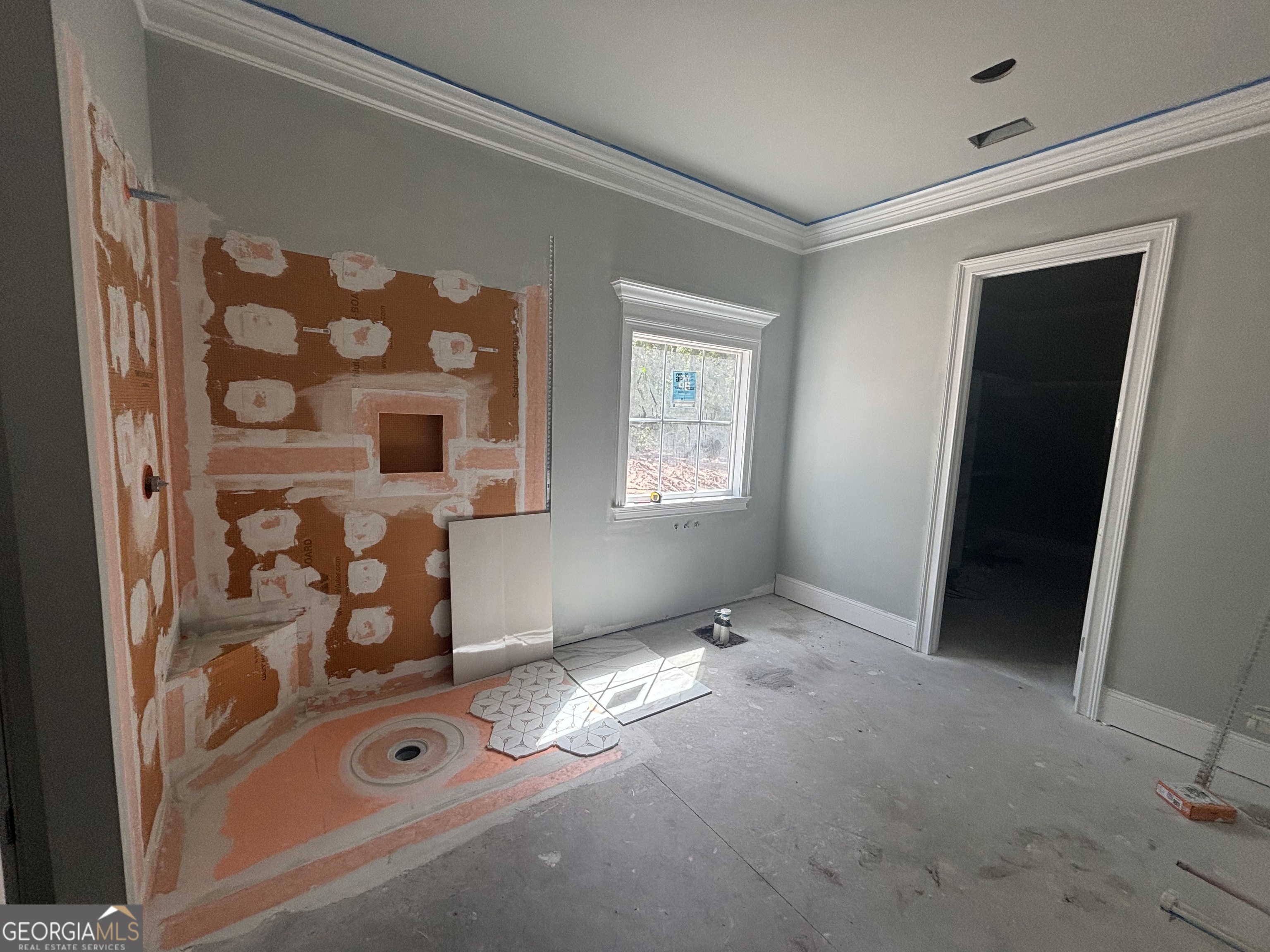 119 Hampton Point Drive St. Simons Island, GA 31522 - Photo 9 of 37 wooden floor and window in a room