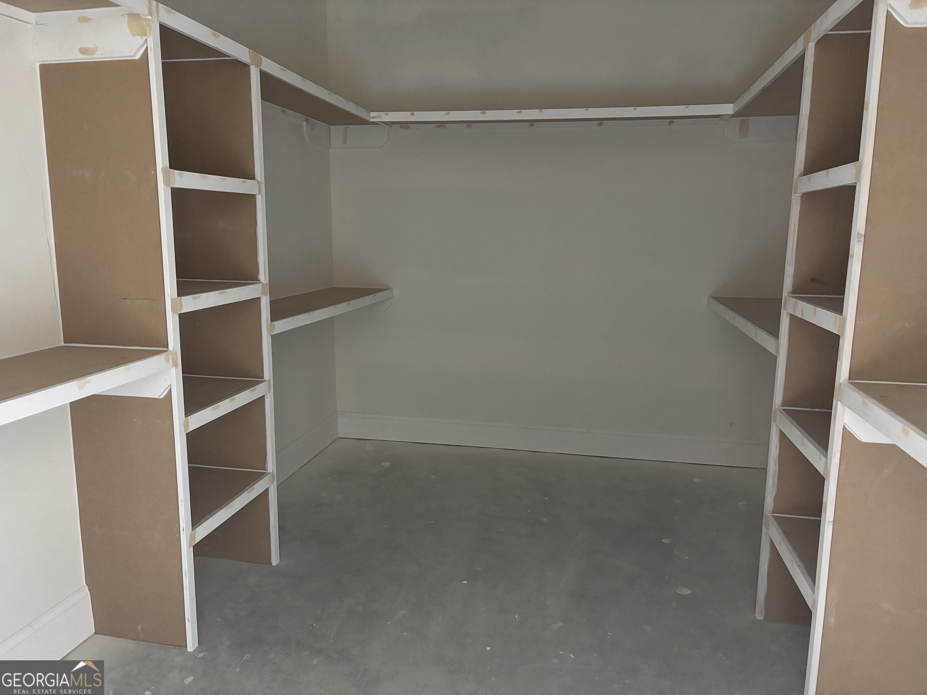 119 Hampton Point Drive St. Simons Island, GA 31522 - Photo 10 of 37 a view of an empty walk in closet