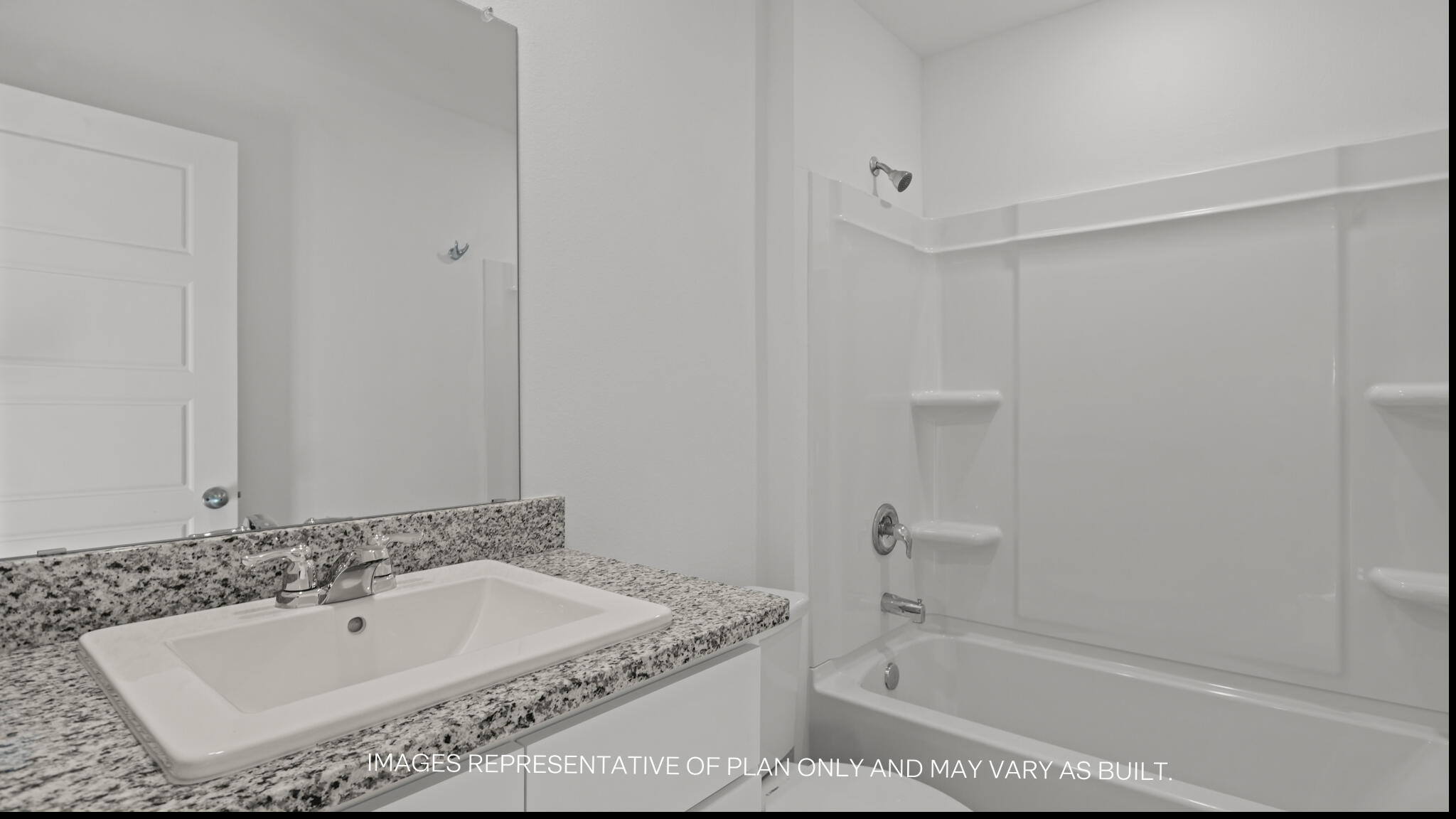 2224 150th Place Lubbock, TX 79423 - Photo 14 of 16 a bathroom with a tub sink and mirror