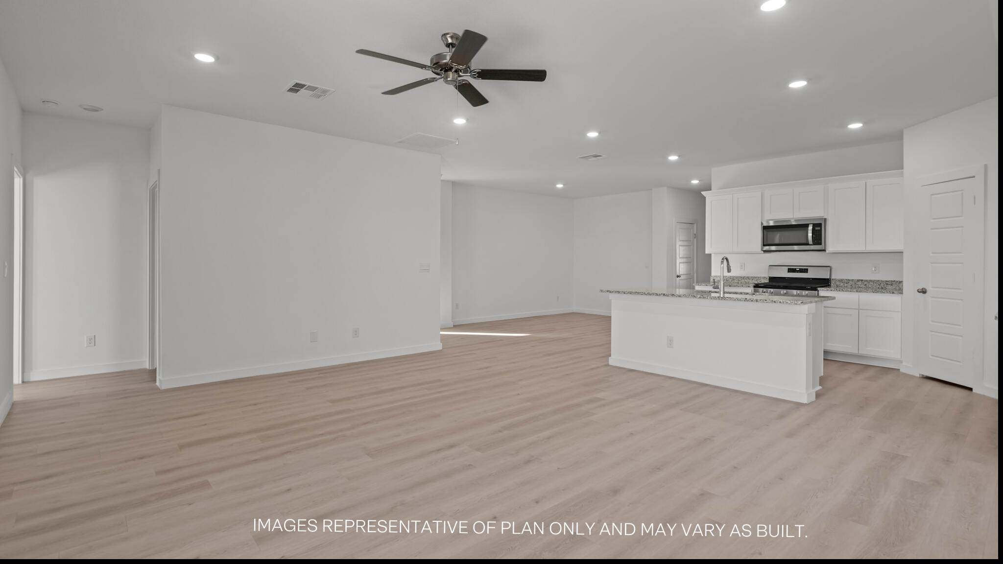 2224 150th Place Lubbock, TX 79423 - Photo 6 of 16 a view of kitchen with microwave and cabinets