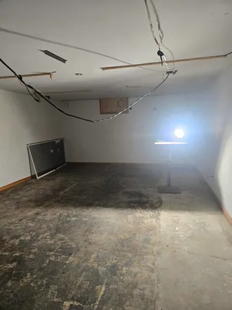 a view of a room with an empty space