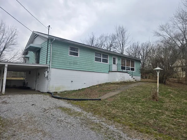 a front view of house with yard