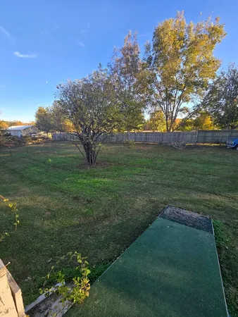 a view of a golf course with a garden