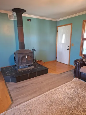 a bedroom with a bed and a mirror