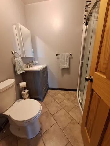 a bathroom with a toilet and a sink