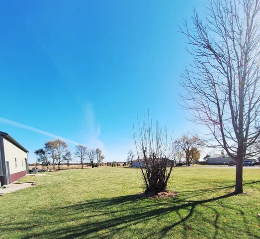 a view of a water fountain and an outdoor space