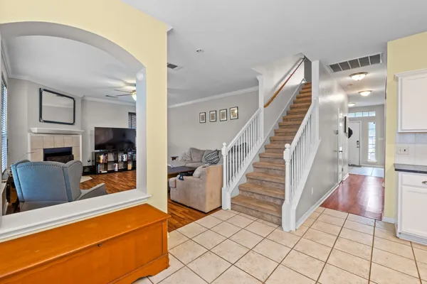 a view of a living room and a livingroom with furniture