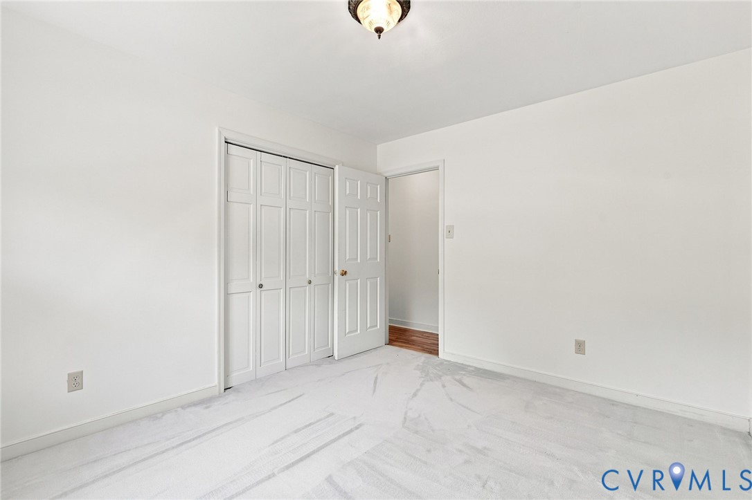 2981 Smokey Road Aylett, VA 23009 - Photo 54 of 84 Bedroom 2. White-painted walls, light-colored carp