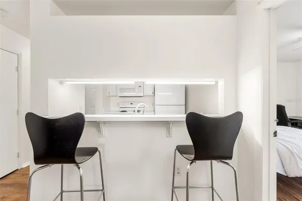 a table and chairs in a room