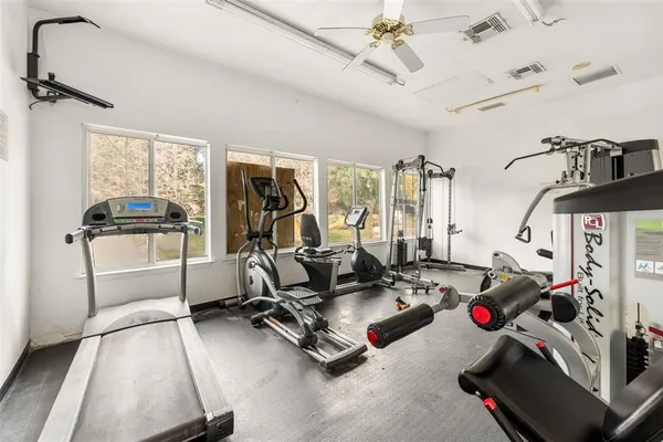 a view of a room with gym equipment