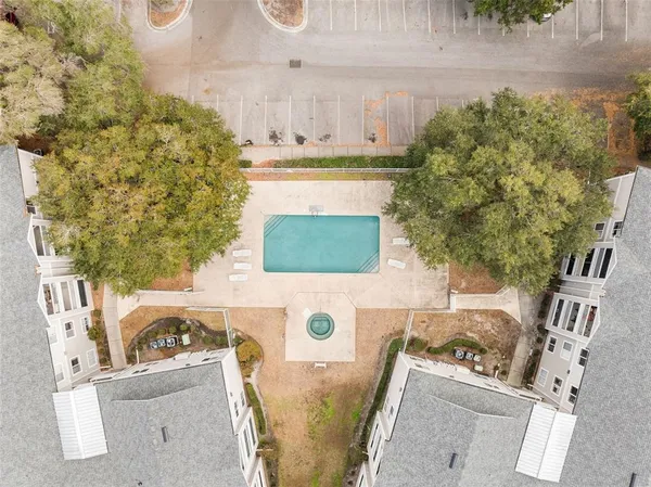 a view of a house with a snow in the yard