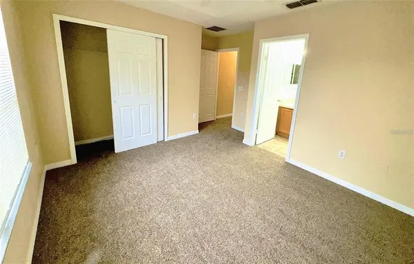 a view of a bathroom with a glass door shower