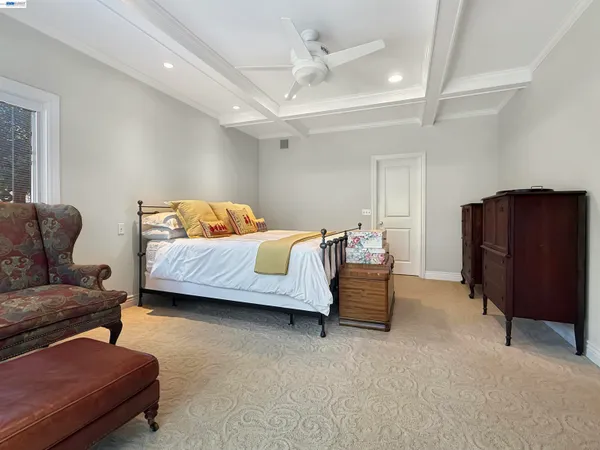 a bedroom with furniture and a couch