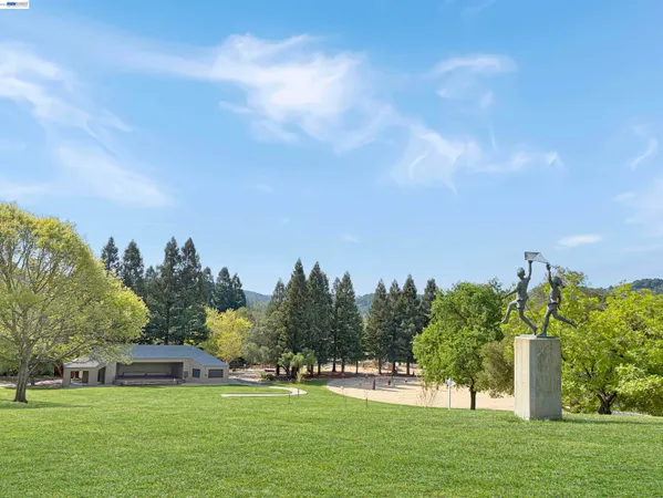 a view of a golf course with a lake