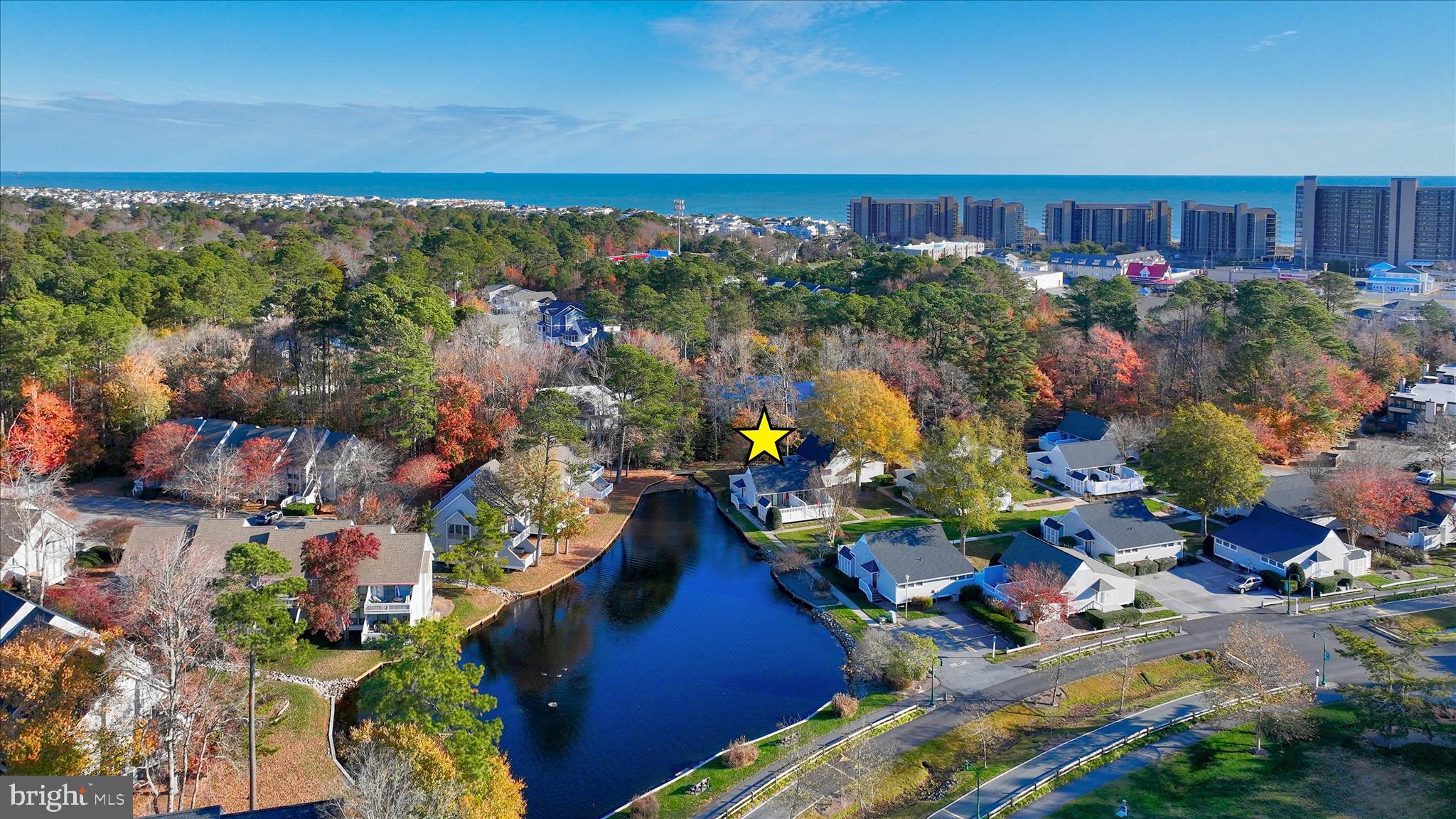 39655 Tie Breaker Court, Unit 4801 Bethany Beach, DE 19930 - Photo 3 of 58 a view of a city and a lake view