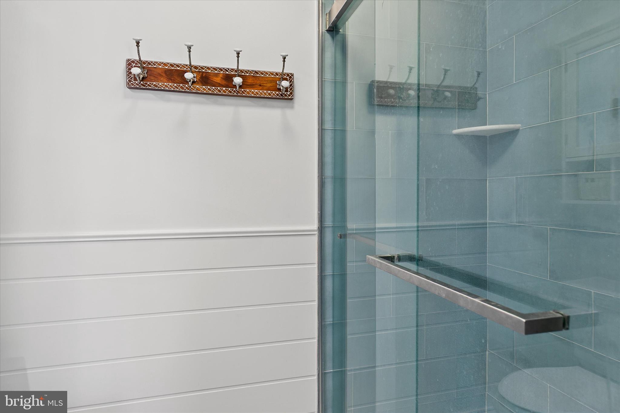 39655 Tie Breaker Court, Unit 4801 Bethany Beach, DE 19930 - Photo 30 of 58 a bathroom with a shower