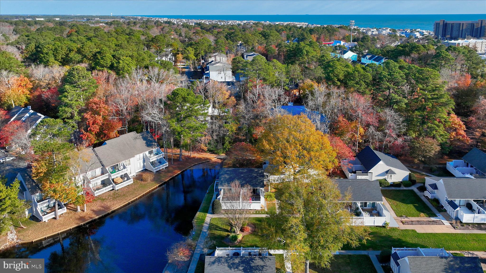 39655 Tie Breaker Court, Unit 4801 Bethany Beach, DE 19930 - Photo 36 of 58 an aerial view of residential houses with outdoor space