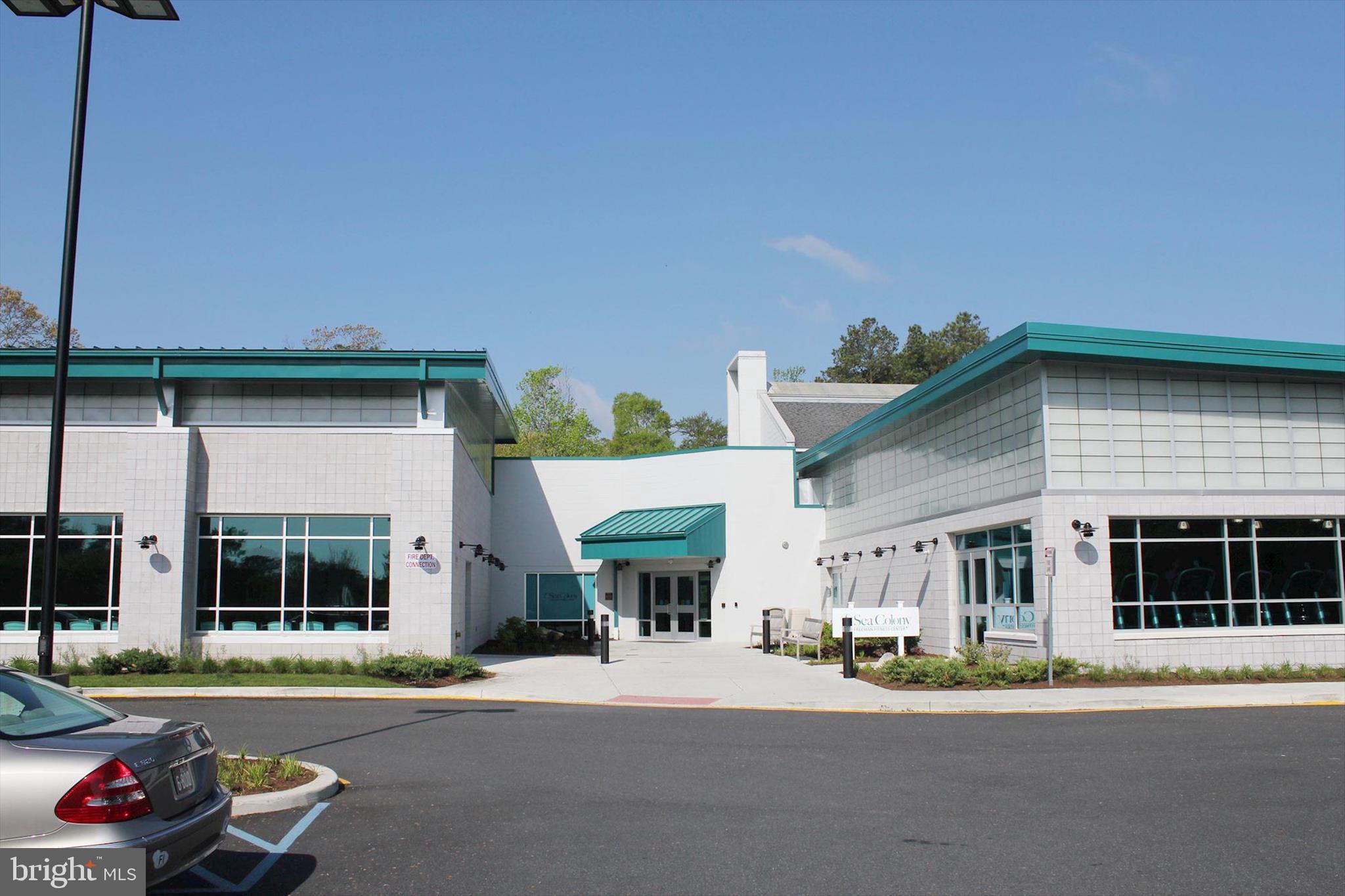39655 Tie Breaker Court, Unit 4801 Bethany Beach, DE 19930 - Photo 42 of 58 a front view of a building with street